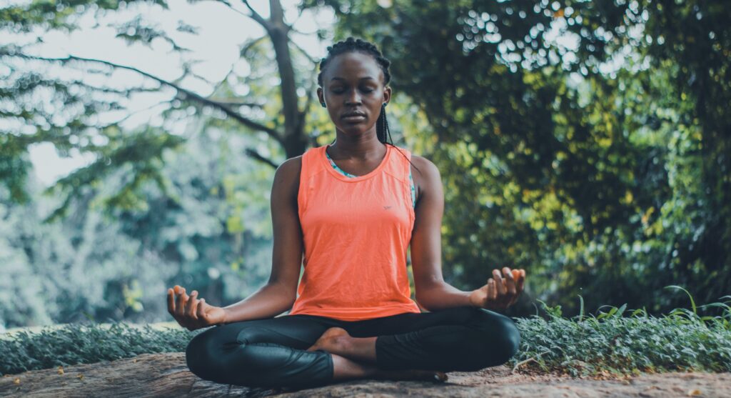 woman-meditating-in-the-forest